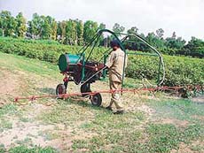 Working of a high-capacity self-propelled sprayer developed by the PAU being demonstrated to mediapersons in Ludhiana on Friday. 