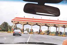 Toll booths are a regular feature on the new N H 4