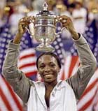 Venus Williams poses with her US Open trophy