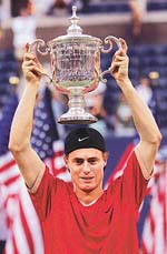 Lleyton Hewitt of Australia holds the trophy after winning the men's final at the US Open Tennis Championship in New York on Sunday.
