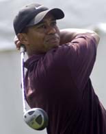 Tiger Woods tees off on the first hole during the fourth round at the Canadian Open in Montreal, on Sunday.