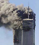 Smoke billows from the two World Trade Center towers after planes crashed into each tower in New York on Tuesday.