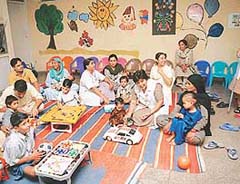 Ailing children and their parents share a happy moment with the staff of the Paediatric Gastroenterology Department of the PGI in Chandigarh. 