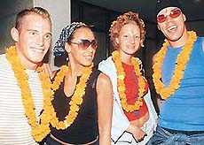COME COME BARBIE, LETS GO PARTY: The delightful foursome of the international Dutch pop group Vengaboys sport garlands at their arrival in Hotel Mount View in Chandigarh on Saturday.