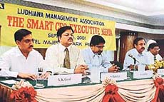 Mr Mahesh Munjal, vice-president, Mr V.K. Goyal, general secretary of the LMA, along with faculty members, Mr S. Mukarjee and Mr K. Jayaraman, at the inaugural session of a development programme on Smart CEO/Executive Agenda organised by the LMA in Ludhiana on Saturday.