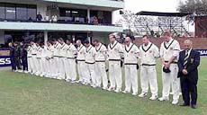 The South African cricket team observes a minutes silence for those lost in the New York terrorist attacks prior to the start of their second five-day cricket Test against Zimbabwe in Bulawayo. 