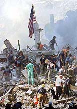 An American flag is posted in the rubble of the World Trade Center on Thursday in New York.