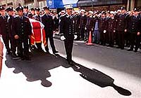 The coffin of New York Fire Department Chaplain Rev. Mychal Judge is carried to St. Francis of Assisi Church during his funeral in New York on Saturday.