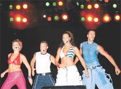 DEADLY ON STAGE: Vengaboys, the Spanish pop group comprising Kim, Denice, Roy and Yorick, are captured in a rocking pose on the stage of Circus Ground in Sector 17 during the Pepsi Vengaboys concert on Sunday.