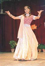 A student performs dance at a freshers party held at the Government College for Women in Ludhiana.