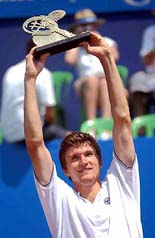 Jan Vacek of the Czech Republic holds up his trophy after winning the Brazil Open in Sauipe, Brazil on Sunday.