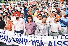 Supporters of PUSU-ABVP-HSA-AISSF with their candidates going round the PU campus on Tuesday.