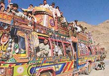 Afghans travel in buses