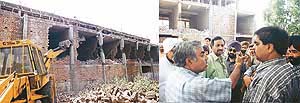Portion of a commercial complex in Haibowal that was demolished for violation of building bylaws and (right) BJP councillor Sunil Mehra argues with the Municipal Town Planner, Mr S.S. Bhatia, over the demolition, in Ludhiana on Tuesday.