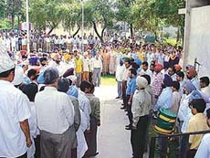 The Deputy Commissioner, Mr S.K. Sandhu, and employees of other government departments observe two-minute silence to mark the National Solidarity Day at Mini Secretariat in Ludhiana on Tuesday.