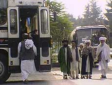 A video grab shows Afghan clerics boarding a bus.