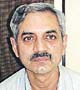 Dr. Arun Mitra 