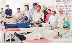 Students of Arya College donate blood at a camp organised by the NSS members