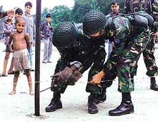 Bangladesh soldiers set up a camp in Dhaka on Saturday, ahead of the October 1 general elections. 