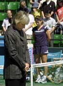 US tennis legend Martina Navratilova (L) leads a moment of silence for victims of attacks on the USA