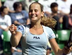 Jelena Dokic of Yugoslavia celebrates
