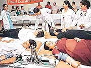 Volunteers donate blood at a camp in Sector 18, Chandigarh, on Monday. 