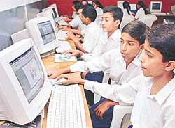 Students of Govt. Model Senior Secondary School sector-16, Chandigarh trying their hand in a computer 