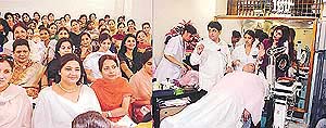 Beauticians from Punjab, Haryana and Himachal Pradesh attend the two-day seminar on beauty and skin treatment organised in Ludhiana on Monday; and (right): Oscar Pareira demonstrates the latest trends in facials and skin treatment.