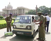 Security personnel checking the vehicles at north block in New Delhi on Monday in the wake of bomb hoax in south block on Sunday night. 