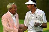 Robert Allenby or Melbourne, Australia, right, the winner of the Marconi Pennsylvania Classic is presented the winners trophy 
