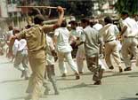Police personnel chasing activists of Samata party
