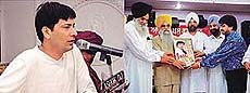 (Left) Jasbir Jassi and (right) Mr Jagjit Singh Garcha, Technical Education Minister, releases the cassette of Surinder Chhinda at a function organised on Friday evening.