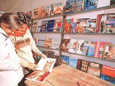 Visitors browse books at the National Book Fair in Sector 17, Chandigarh, after the fair wasinaugurated on Friday