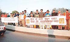 Members of the Bharatiya Janata Yuva Morcha organise a ‘raksha sankalp abhiyan’ to awaken the public against terrorism, in Chandigarh on Friday.