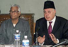 Jammu and Kashmir Chief Minister Farooq Abdullah speaks during a meeting