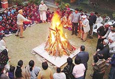 Inmates of Old Age Home, Sector 15, celebrate Lohri in Chandigarh on Sunday. 