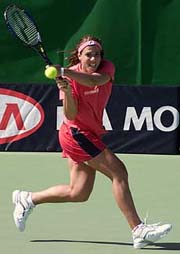 Jennifer Capriati of the USA returns a ball during a practice session at Melbourne Park, venue on Sunday at Melbourne.