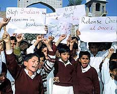 Pakistani children chant slogans in Multan