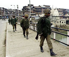 BSF men patrol in Srinagar