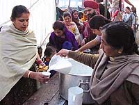 Sweet sherbat being offered to devotees on the occasion of Guru Gobind Singhs birth anniversary in the Capital on Monday.