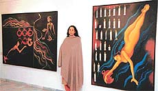 Arpana Caur poses with works from her latest series titled The legend of Sohni.