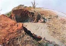 A breach in the southern ash dyke of the Ropar thermal plant