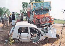 The mangled remains of a car after a road accident