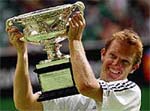 Sweden's Thomas Johansson holds the men's singles trophy