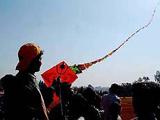 Mohd. Ayyub from Ahmedabad flies his 150 kites in a row