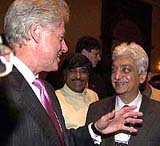 Former US President Bill Clinton and billionaire Wipro Chairman Azim Premji 