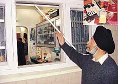 Wg Cdr M.S. Bhomia (retd) shows the broken window from where the burglars gained entry into his Sector 36 house in Chandigarh on Saturday