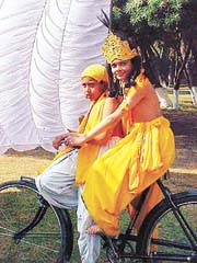 Kids dressed as Krishna and Sudama go for a ride on a bicycle in Nehru Rose Garden in Ludhiana.