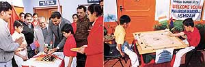 Mr S.L. Lotey, DSO, Ludhiana, inaugurate the annual sports festival at New S.M.D. Senior Secondary School, Ludhiana, and (right) a carrom match in progress during the sports festival.