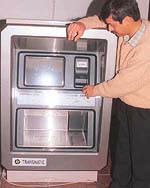 An automatic cheque collecting machine at the Sector 34 telephone exchange.